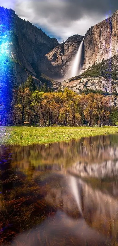 Breathtaking mountain waterfall with autumn trees and grass.