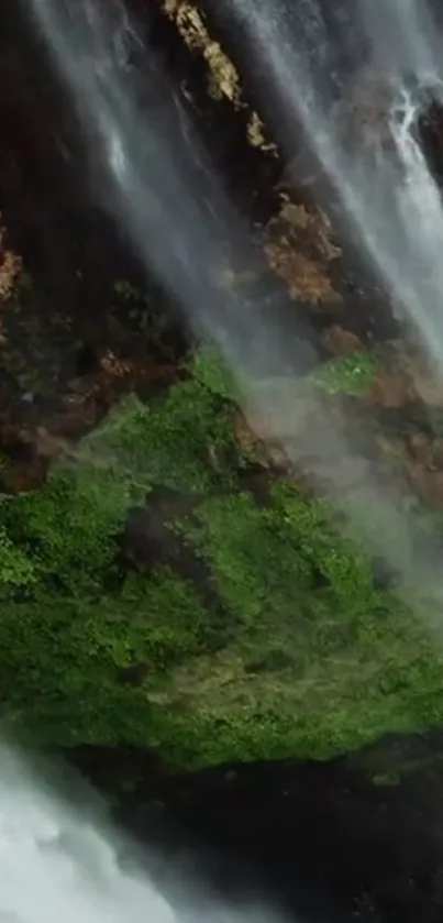 Stunning waterfall wallpaper with lush green scenery.