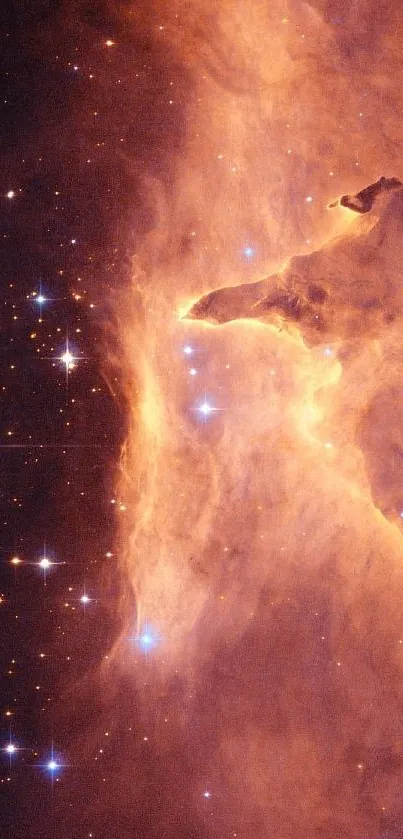 Orange nebula with twinkling stars in a cosmic scene, perfect for mobile wallpaper.