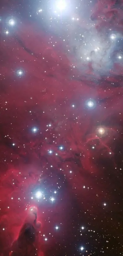 Vibrant nebula wallpaper with stars and cosmic colors.