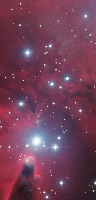 Red nebula with sparkling stars in a cosmic phone wallpaper.