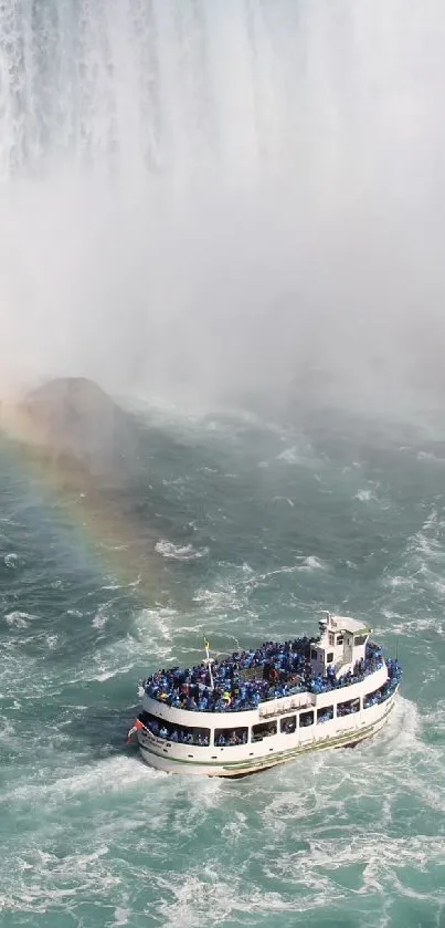 Niagara Falls with rainbow and boat in scenic view.