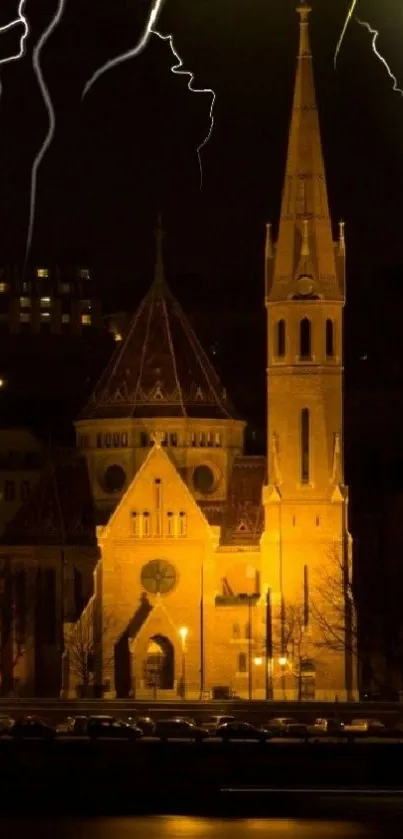 Illuminated church at night with lightning in the sky.