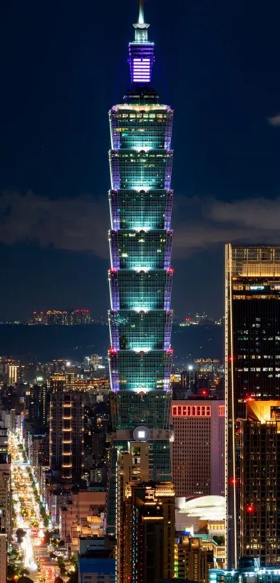 Taipei city skyline at night with illuminated Taipei 101 skyscraper.