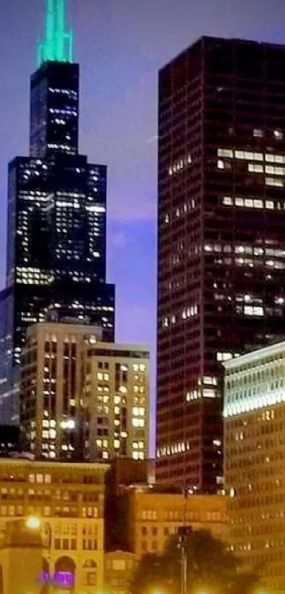 City skyline at night with glowing skyscrapers.