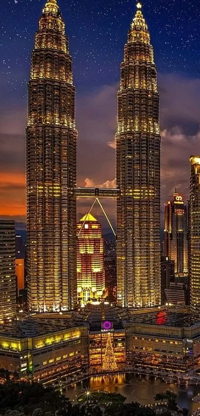 Kuala Lumpur skyline with illuminated Petronas Towers at night.