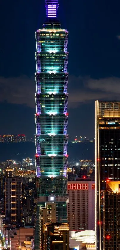 Night cityscape featuring Taipei 101 tower illuminated.