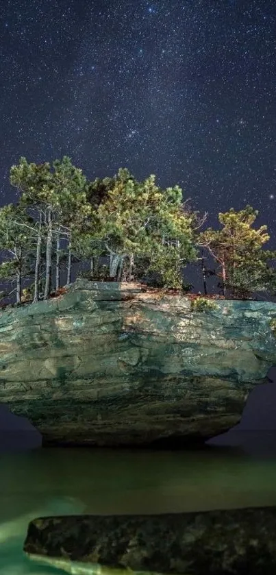 A small island under a starry night sky with serene water reflections.