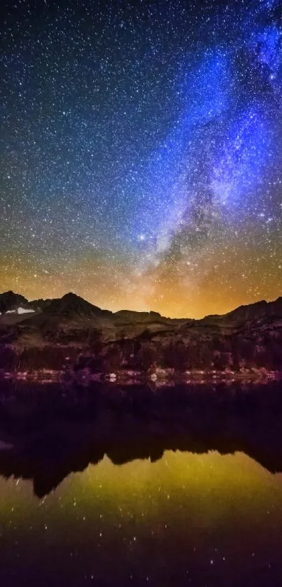 Night sky with Milky Way over mountains and lake reflection.