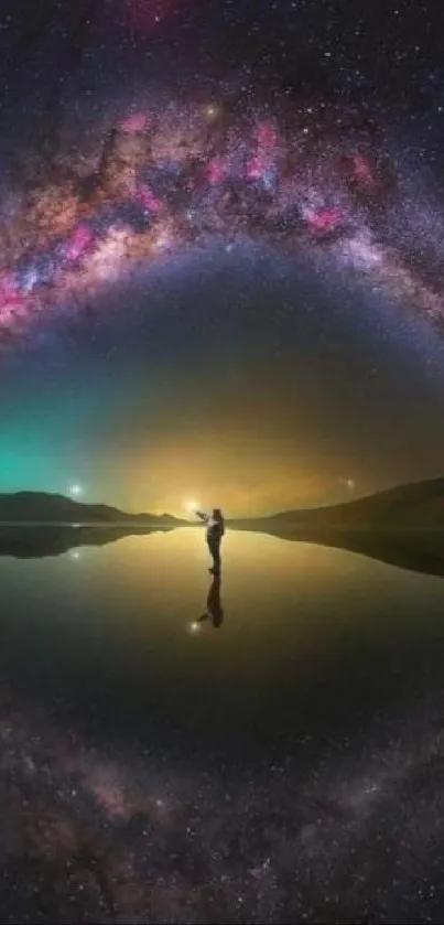 Person under Milky Way's night sky arc over calm lake.