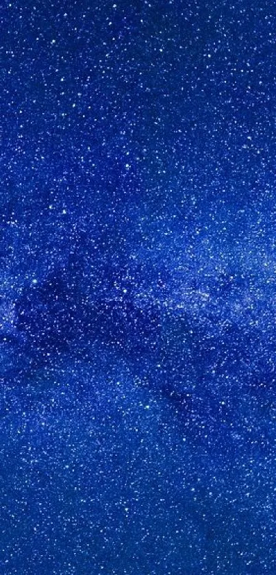 Deep blue night sky with stars and galaxy pattern.