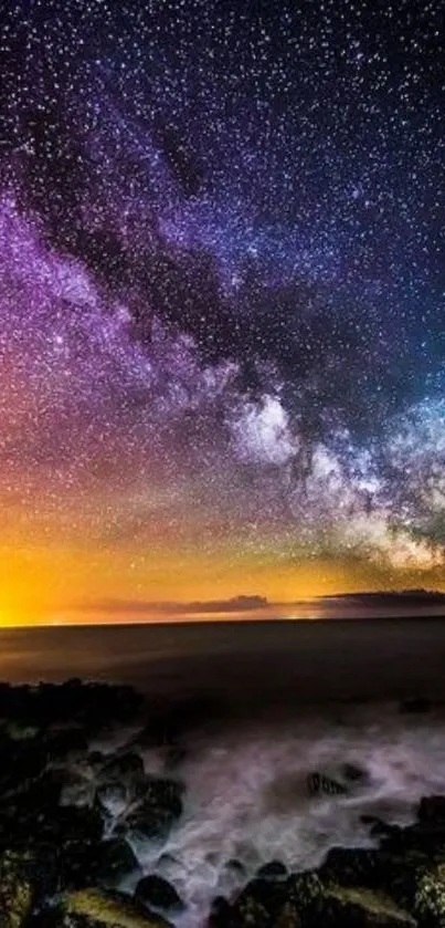 Vibrant night sky with galaxy and stars over a scenic coastline.