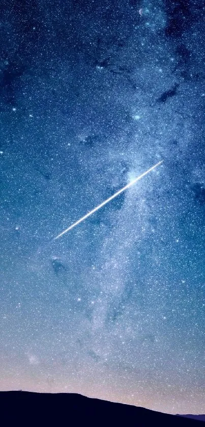 Starry night sky wallpaper with a bright shooting star.