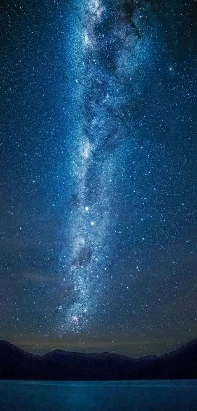 Beautiful night sky with Milky Way galaxy over mountains.