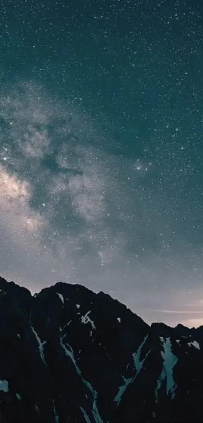 Starry night sky over dark mountain silhouette.