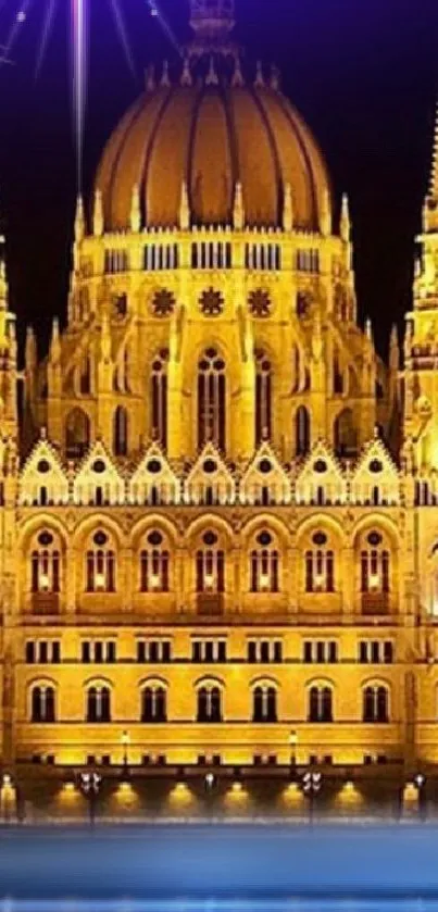 Golden architectural castle at night with glowing lights.