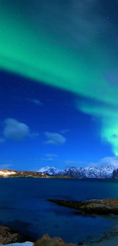 Beautiful northern lights over Arctic landscape with starry sky.