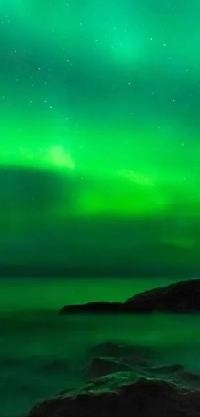 Northern lights illuminating a serene nighttime landscape.