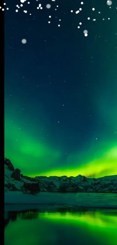 Northern lights over snowy mountains and lake reflection.
