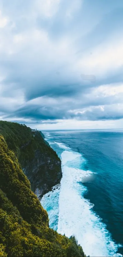 Cliffside view with ocean waves and cloudy sky, perfect for a serene mobile wallpaper.