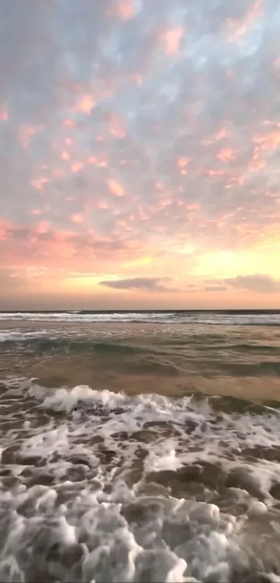 Beautiful ocean sunset with calm waves and colorful sky.