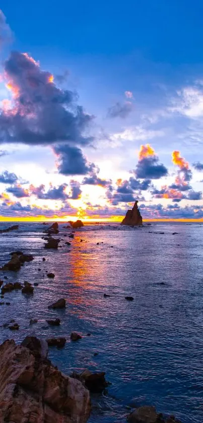 Stunning ocean sunset with vibrant clouds and tranquil waters.