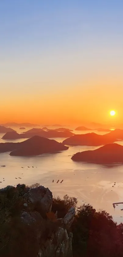 Tranquil ocean sunset with distant islands, vibrant colors, and calm waters.