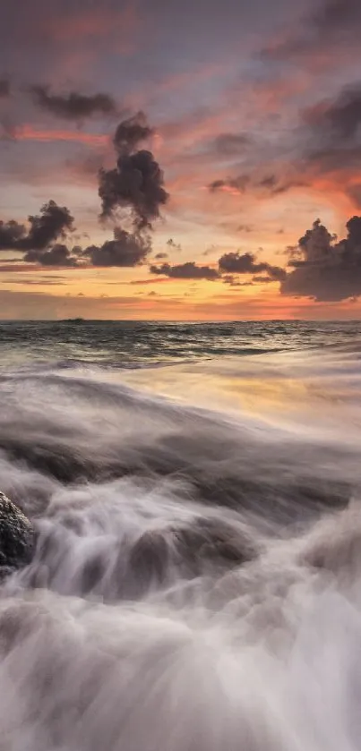 Vibrant ocean sunset with waves and colorful sky.