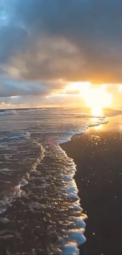 Golden sunset over ocean waves with dramatic clouds.