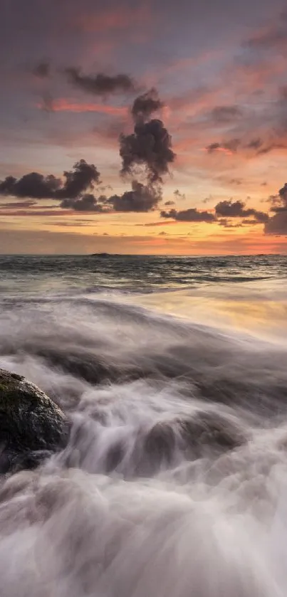 Breathtaking sunset over ocean waves with a dramatic sky and fiery colors.