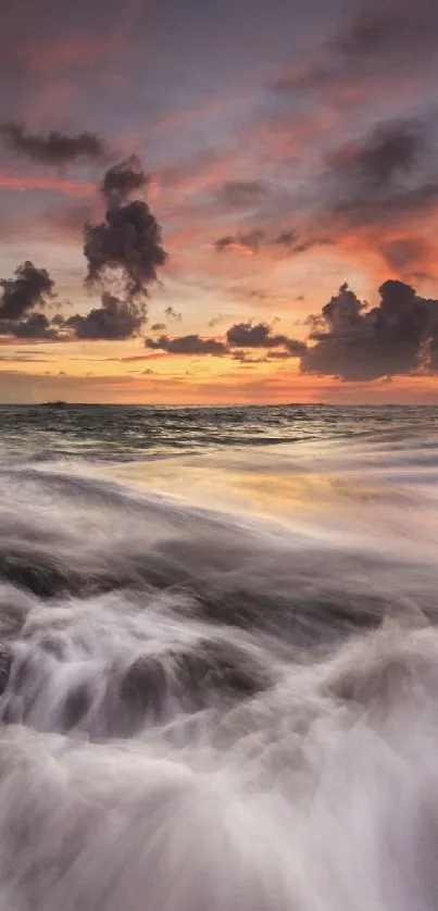 Breathtaking ocean sunset with vibrant sky and flowing waves, perfect for mobile.