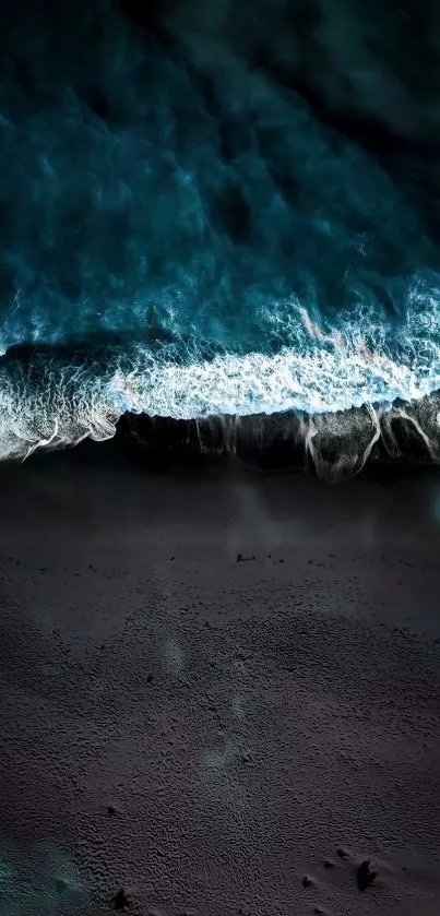 Dark cyan ocean waves breaking on a beach, captured in stunning detail.