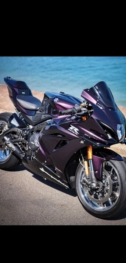 Sleek purple sports bike parked by the water.