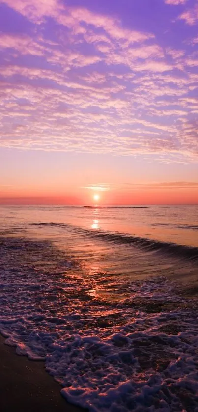 Purple sunset over ocean waves with soothing sky.