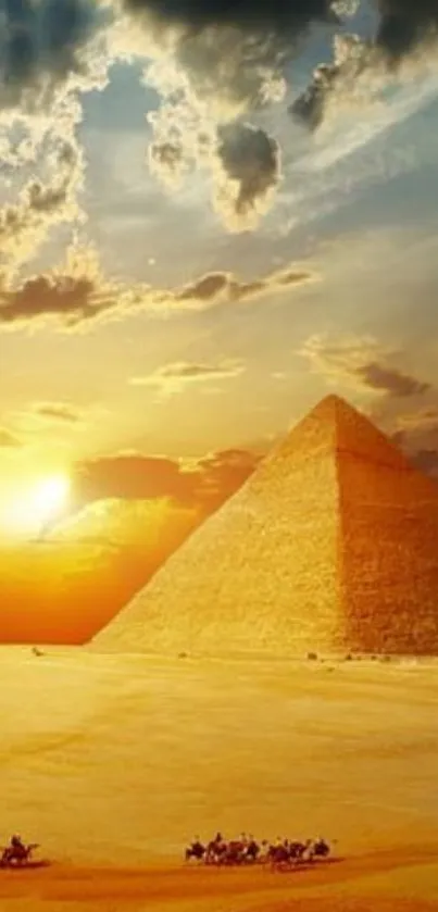 Golden sunset over Egyptian pyramids wallpaper.