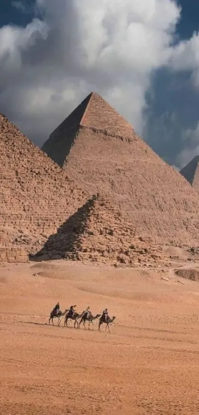 Pyramids of Giza under a dramatic, cloudy sky