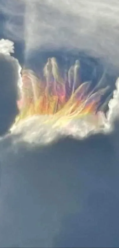 Rainbow cloud burst in a sky wallpaper.