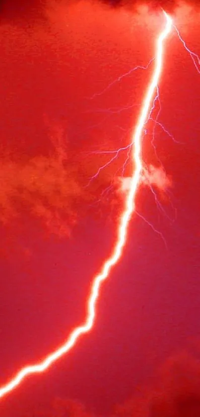 Dramatic red lightning storm with striking bolt.