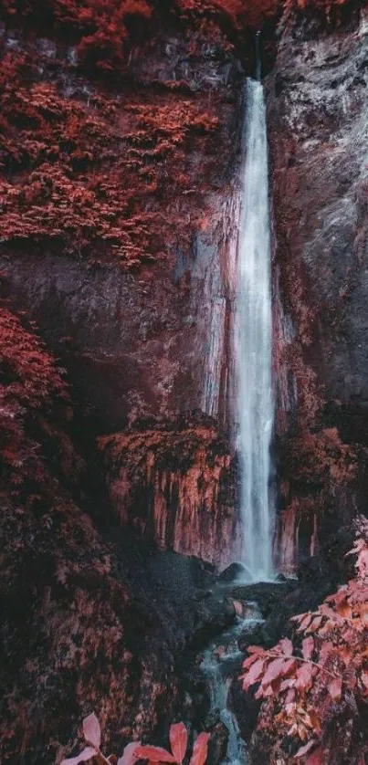 Red foliage with a cascading waterfall.