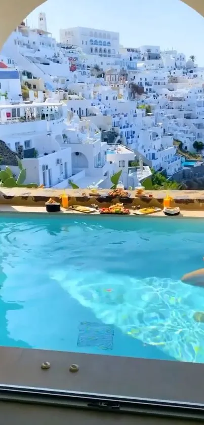 Santorini pool with city view in background.