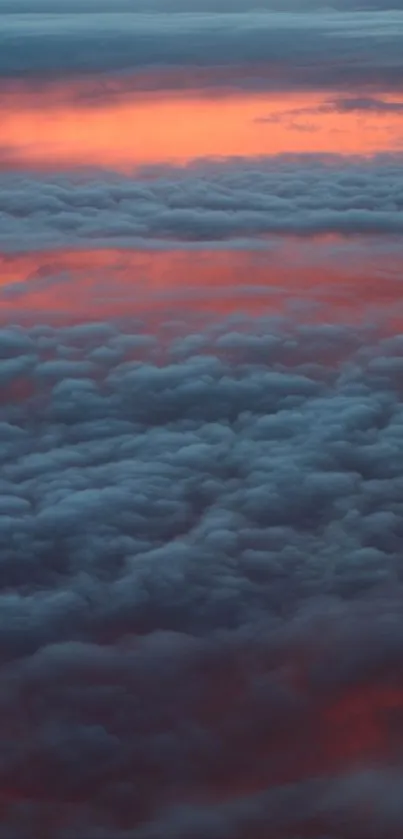 Vibrant sunset sky with orange clouds.