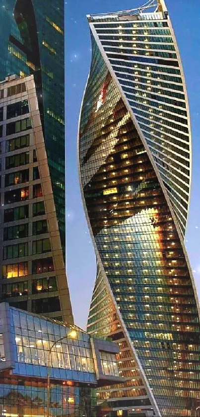 Skyscrapers lit against a twilight sky, featuring modern architectural design.