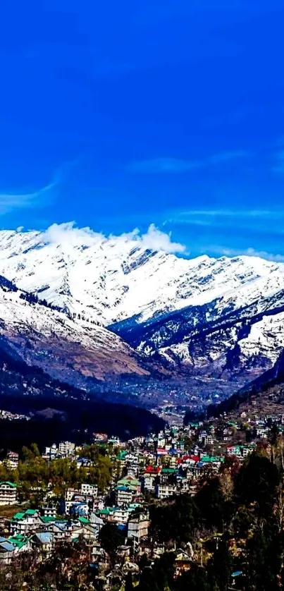 Snowy mountains with blue sky background.