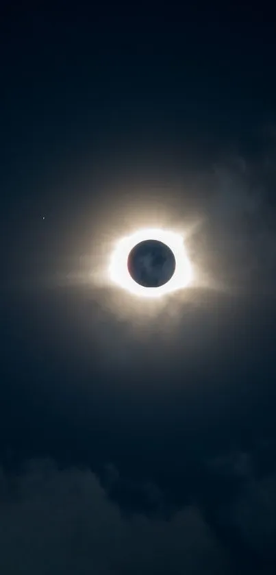 Beautiful solar eclipse with radiant halo in a dark sky.