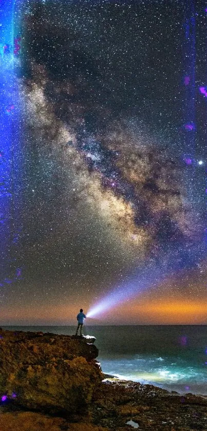 Person stargazing beneath a vibrant starry sky with Milky Way over an ocean horizon.