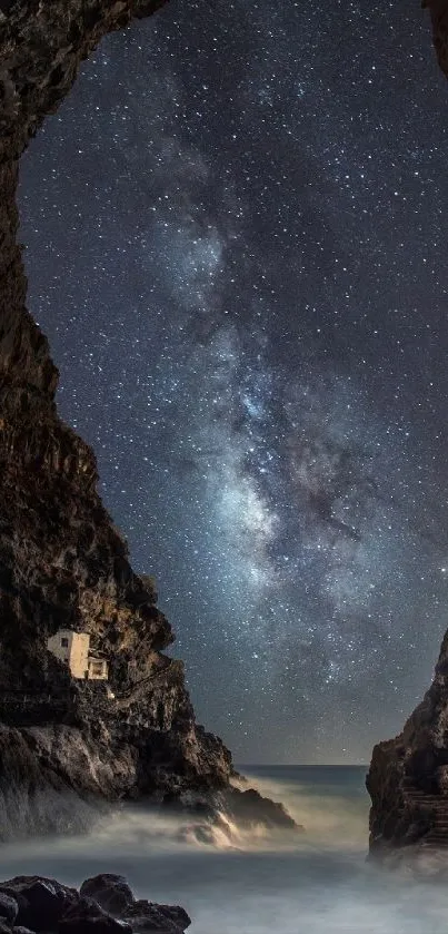 Starry night view through dramatic cave