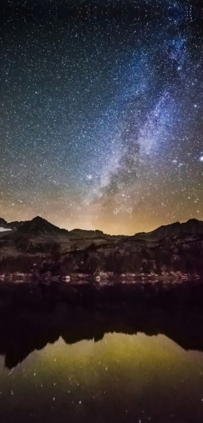 Starry night sky with mountains reflected in a serene lake.