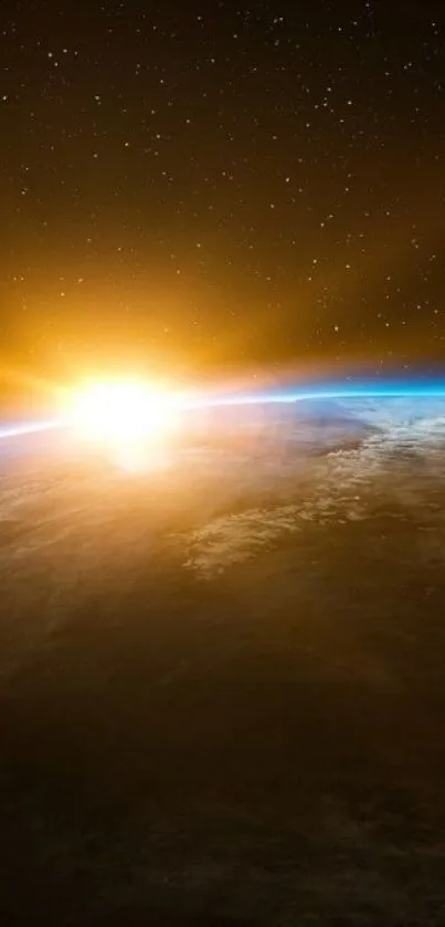 Sunrise over Earth from space, with stars and glowing horizon.