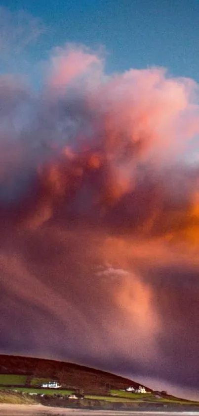 Dramatic sunset clouds over a serene beach.