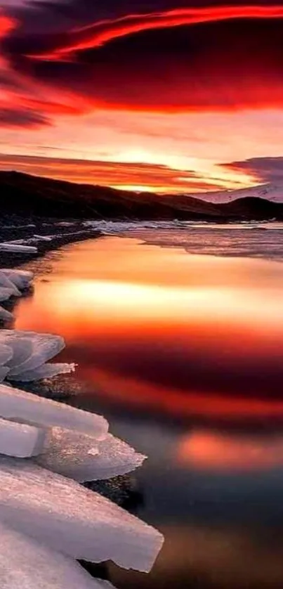 Sunset reflection on icy lake with vibrant colors.